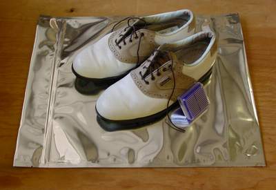 Shoe Saving combination of moisture absorbing dribox with high barrier zipper bag